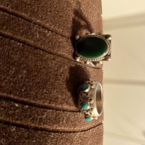 2 rings my mom was a tiny lady she always liked unique things and they are.